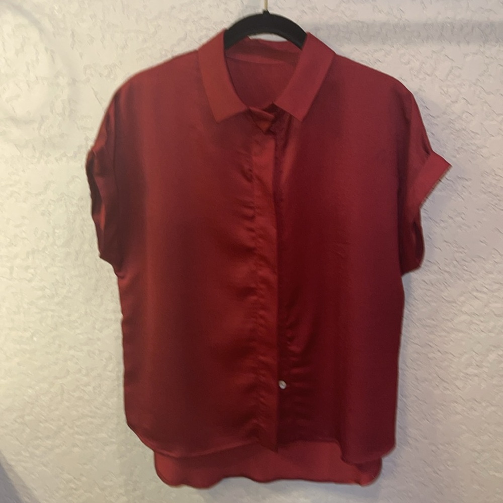 Like new, short sleeve blouse. Merlot in color.